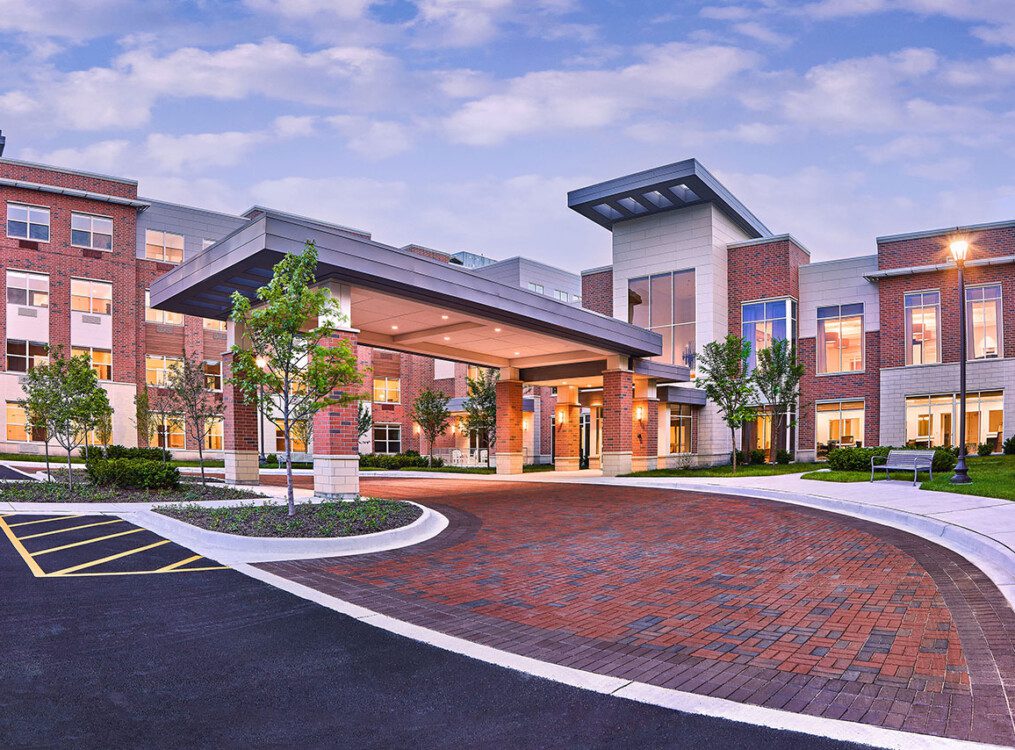 Entrance at Oak Trace Senior Living Community at sunset