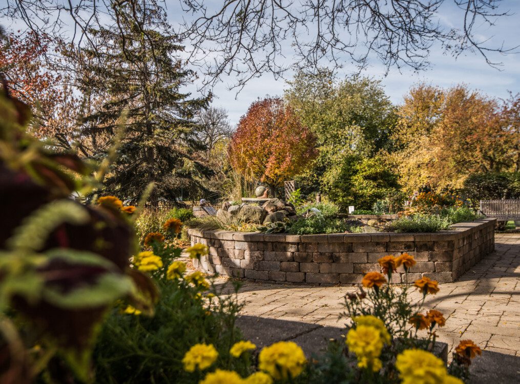 Beautifully landscaped, stone walking paths and garden features at Oak Trace Senior Living Community